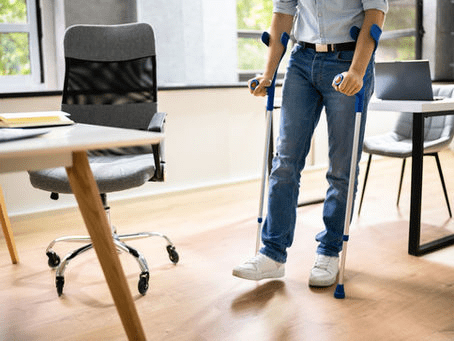 Occupational health trainer showing safe patient transfer with gait belt
